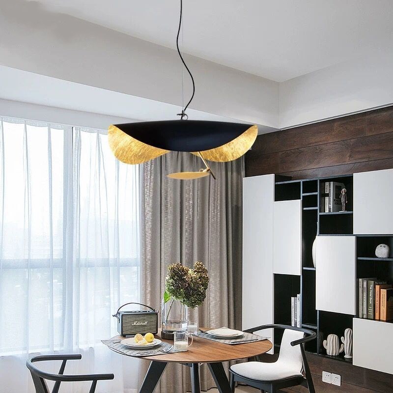 Black Gold Leaf LED Pendant Light on a dining room