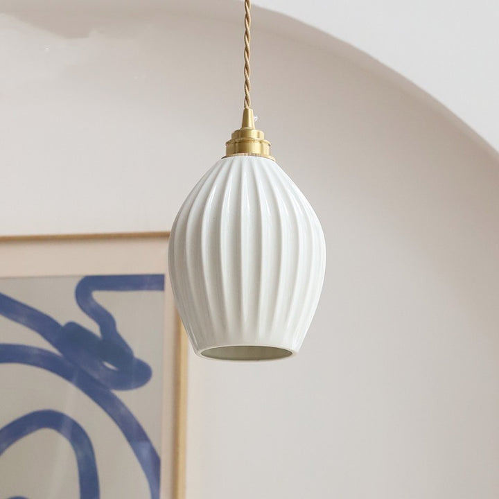 Elegant White Ceramic Pendant Light with Brass Accents